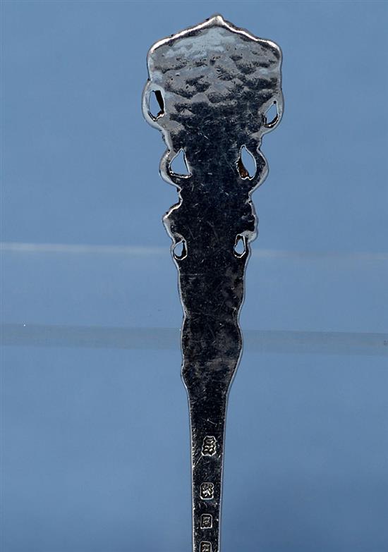 A George V Arts & Crafts cast planished silver spoon, by Omar Ramsden, Length 161mm Weight 1.9oz/61grms